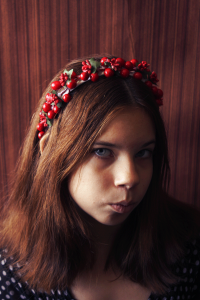 Lena in hair hoop with berries